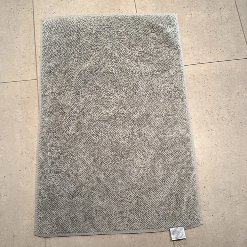 Restoration Hardware bath mat. Gently used. Has one small faded spot.